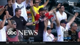 Father stops mid-interview to celebrate after son hits MLB home run